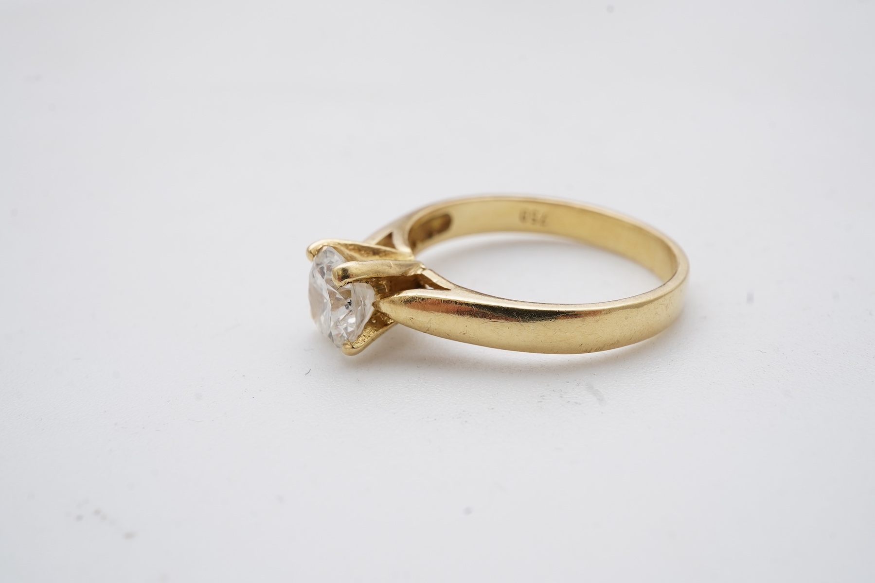 A diamond solitaire ring